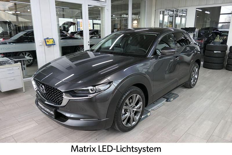 Grau Gebraucht 2024 Mazda CX-30 Exclusive SUV | 28.900 € (Fairer Preis) - Bild 1/4