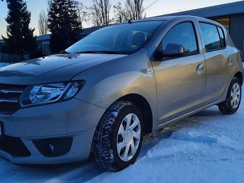 Gebraucht Dacia Sandero 90 PS (66 kW) 2014 Braun Limousine