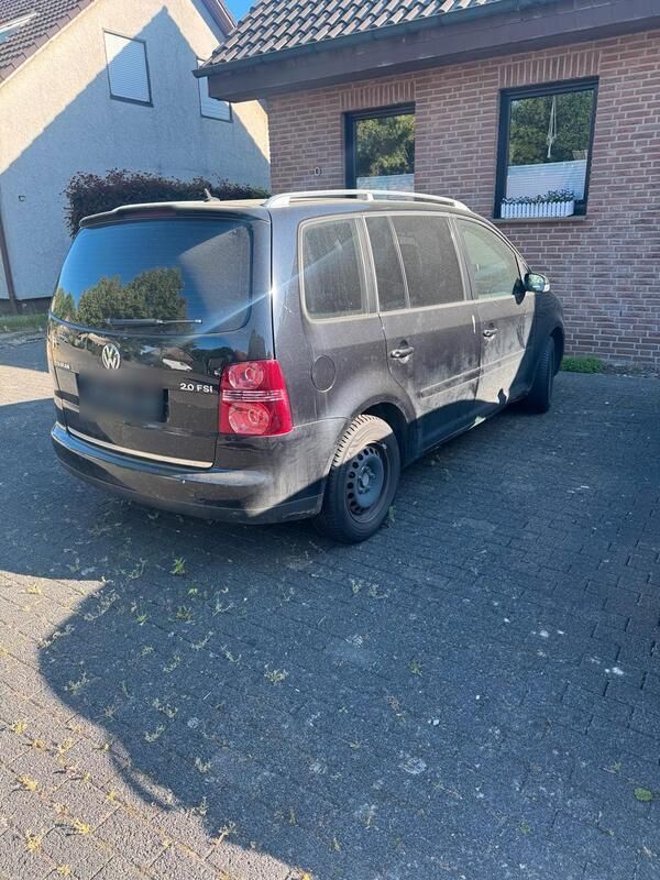 Schwarz Gebraucht 2006 VW Touran Van / Kleinbus | 858 € (Superpreis) - Bild 1/4
