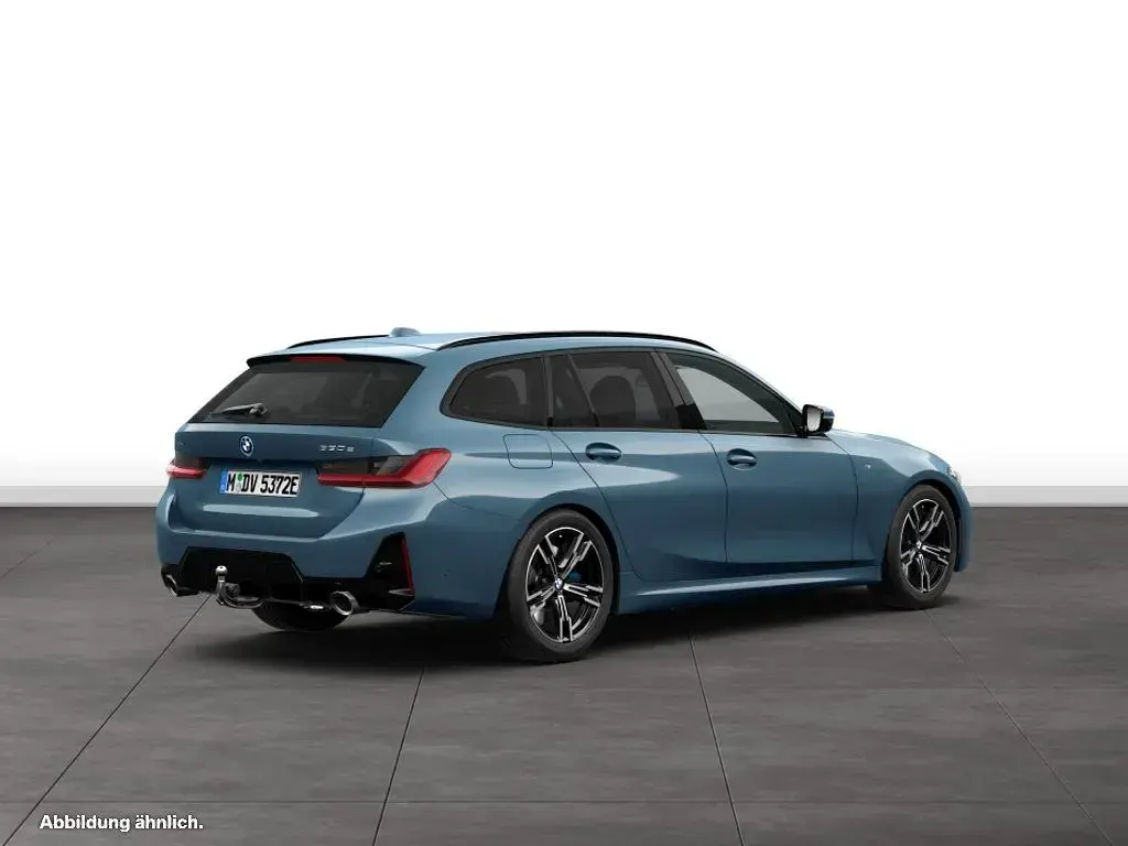 Gebraucht BMW 330e Comfort Edition 292 PS (214 kW) 2025 Arctic race blue metallic Kombi