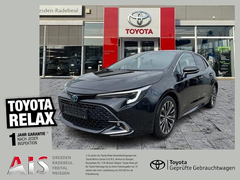 Black mica / ink Gebraucht 2024 Toyota Corolla Team Limousine | 25.770 € (Fairer Preis) - Bild 1/3