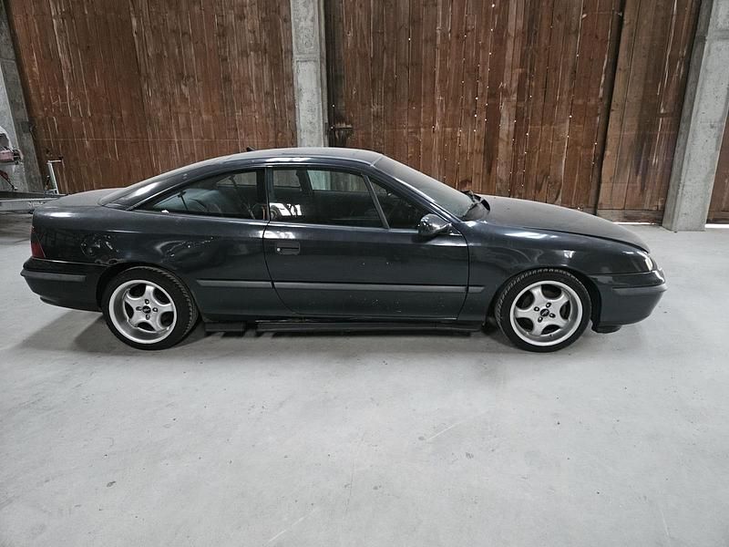 Schwarz Gebraucht 1991 Opel Calibra Coupé | 1.100 € - Bild 1/4