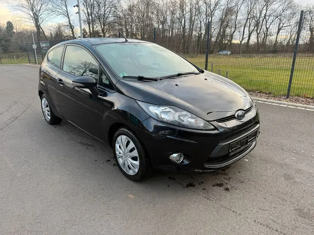 Gebraucht Ford Fiesta 60 PS (44 kW) 2011 Schwarz Kleinwagen