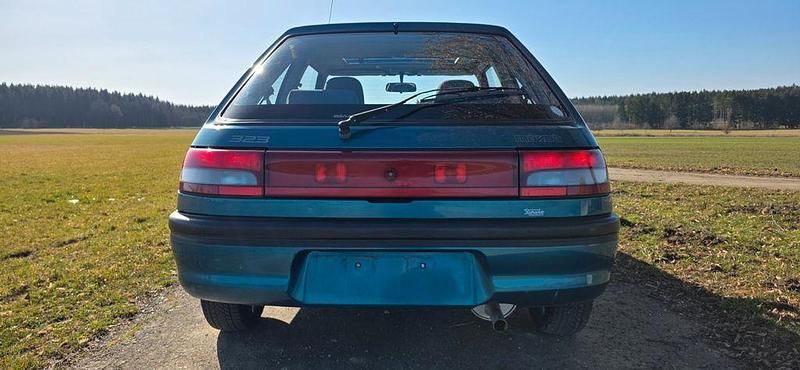Gebraucht Mazda 323 88 PS (64 kW) 1993 Grün Kleinwagen