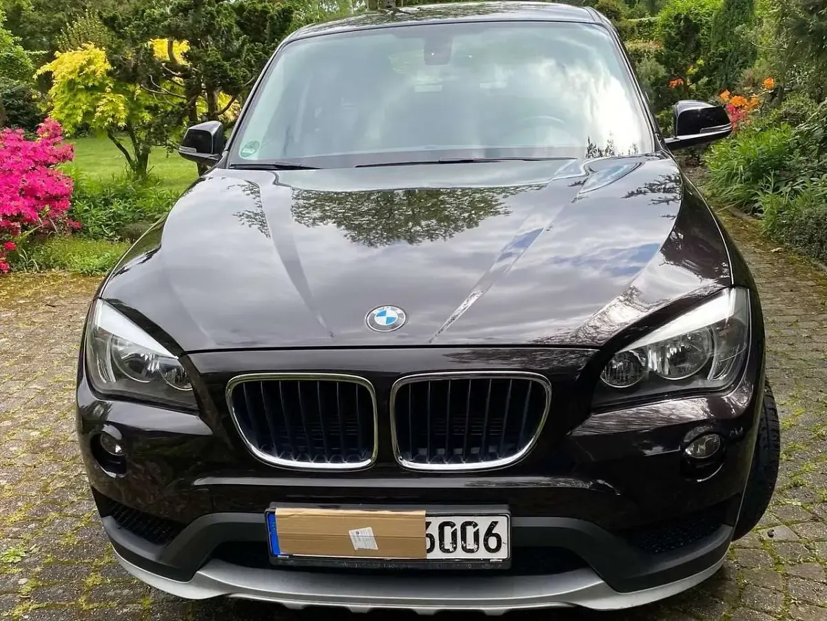 Używany BMW X1 184 KM (135 kW) 2014 Brązowy SUV