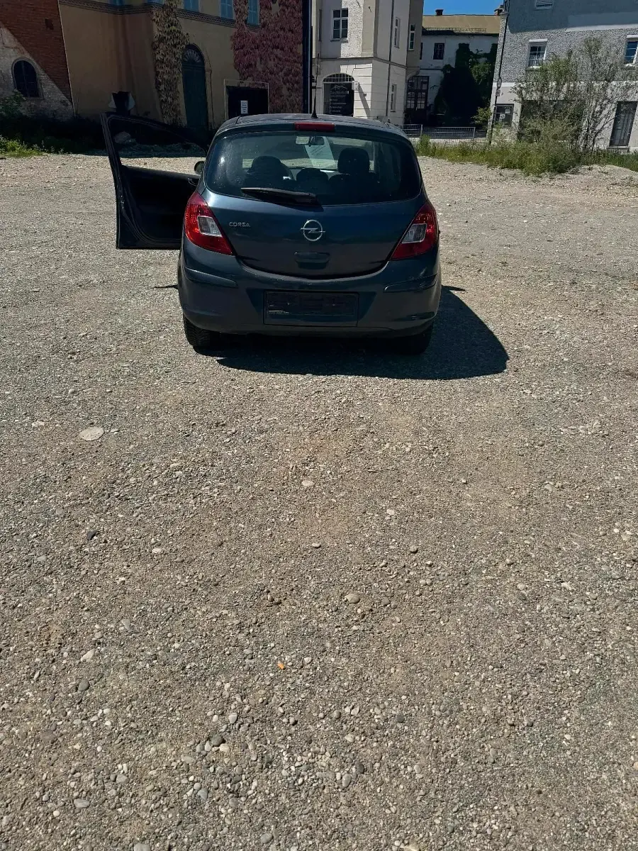 Usado Opel Corsa 90 HP (66 kW) 2008 Cinzento Citadino
