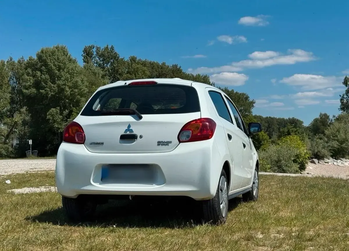 Gebraucht Mitsubishi Space Star Top 71 PS (52 kW) 2015 Weiß Kleinwagen