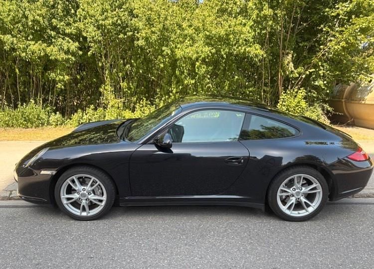 Schwarz Gebraucht 2010 Porsche 911 Carrera 4 Coupé | 52.950 € - Bild 1/4