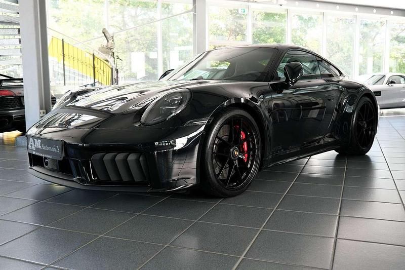 Tiefschwarzmetallic Gebraucht 2025 Porsche 911 Carrera GTS Sport Coupé | 188.800 € - Bild 1/4