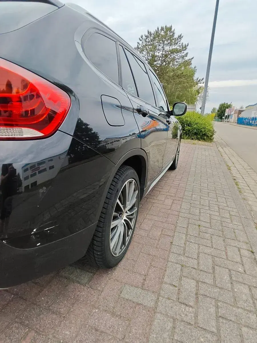 Gebraucht BMW X1 163 PS (119 kW) 2011 Schwarz SUV