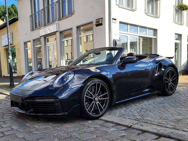 Schwarz Gebraucht 2024 Porsche 911 Carrera Cabriolet Cabrio | 249.900 € - Bild 1/4