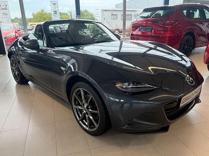Graphitgrau metallic Gebraucht 2017 Mazda MX5 Sports-Line Cabrio | 21.860 € (Etwas zu teuer) - Bild 1/4