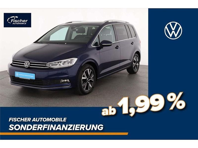 Blau Gebraucht 2024 VW Touran Highline Van / Kleinbus | 37.980 € (Fairer Preis) - Bild 1/3