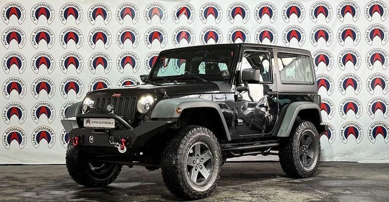 Schwarz Gebraucht 2011 Jeep Wrangler Unlimited Sport SUV | 23.990 € (Etwas zu teuer) - Bild 1/4