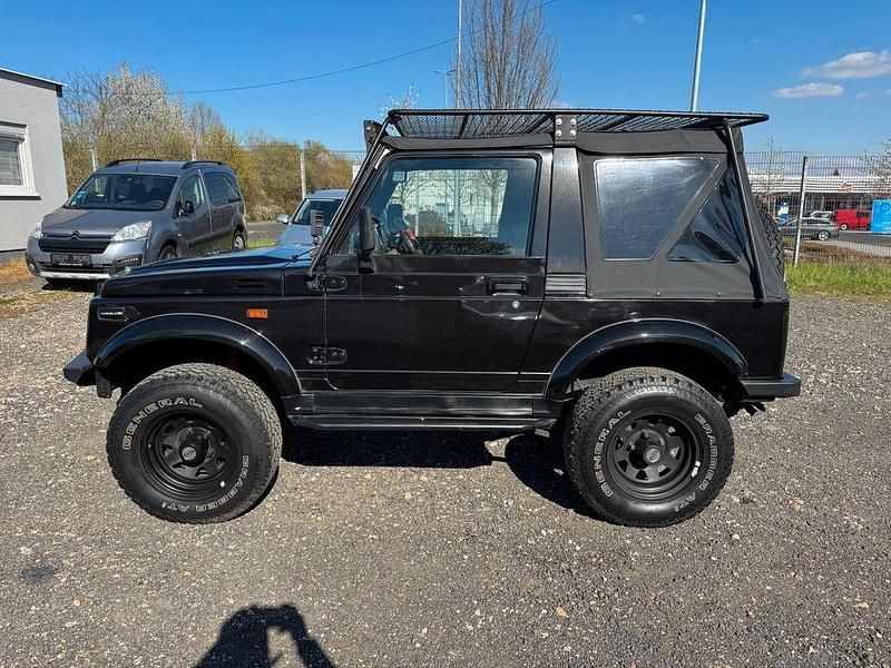 Second-hand Suzuki Samurai 69 CP (50 kW) 1997 Negru SUV