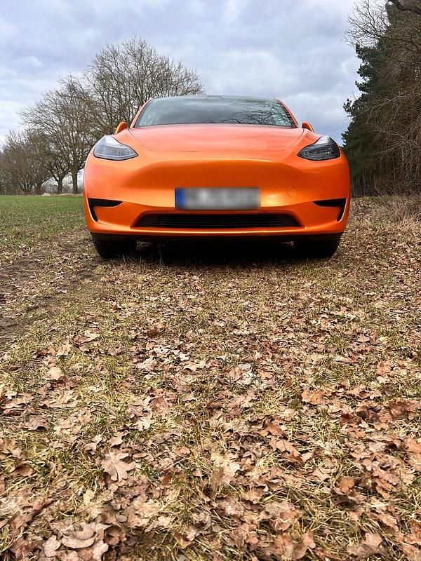 Gebraucht Tesla Model Y 255 kW (347 PS) 2023 Orange SUV