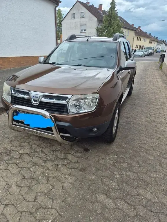 Używany Dacia Duster Prestige 105 KM (77 kW) 2011 Brązowy SUV