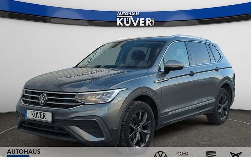 Grau Gebraucht 2024 VW Tiguan Allspace Move SUV | 33.850 € (Superpreis) - Bild 1/4