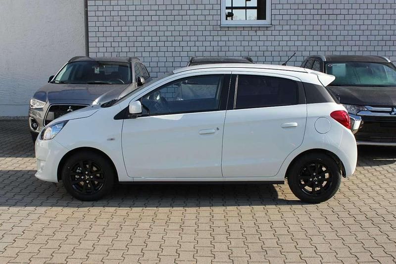 Gebraucht Mitsubishi Space Star Diamant Edition 80 PS (58 kW) 2015 Islandweiß Limousine