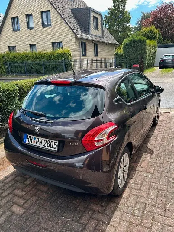 Gebraucht Peugeot 208 Active 82 PS (60 kW) 2013 Braun Kleinwagen