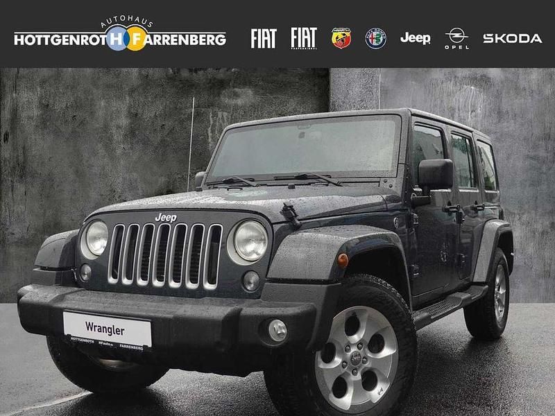 Grau Gebraucht 2017 Jeep Wrangler Unlimited Sahara SUV | 24.990 € (Superpreis) - Bild 1/4