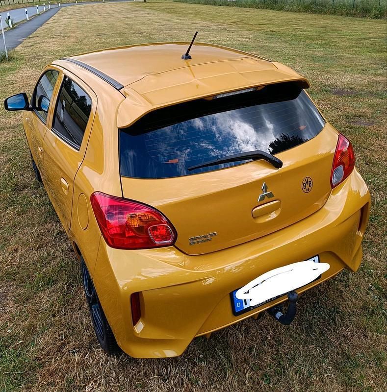 Gelb Gebraucht 2022 Mitsubishi Space Star Select Kleinwagen | 9.700 € (Fairer Preis) - Bild 1/4