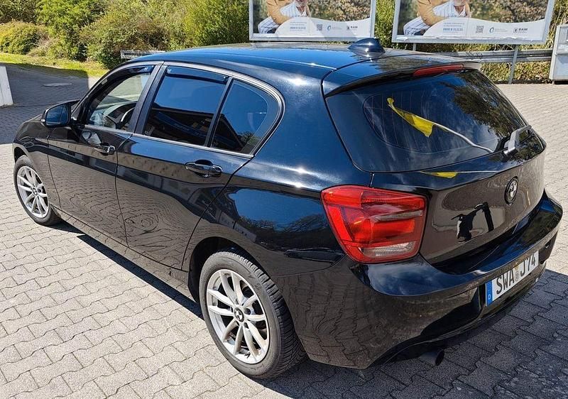 Second-hand BMW 116 Performance 136 CP (100 kW) 2014 Negru Hatchback
