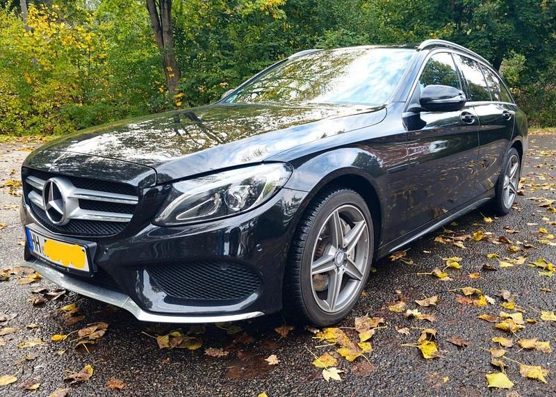 Schwarz Gebraucht 2016 Mercedes C250 AMG line Kombi | 19.399 € (Superpreis) - Bild 1/4