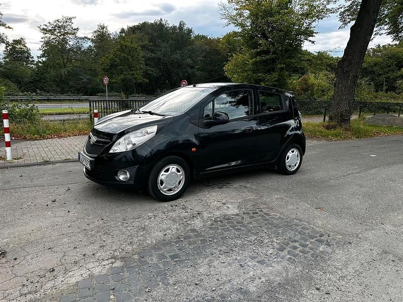 Schwarz Gebraucht 2011 Chevrolet Spark Kleinwagen | 2.080 € (Fairer Preis) - Bild 1/4