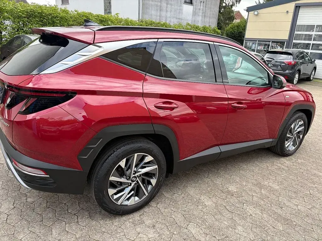 Gebraucht Hyundai Tucson 136 PS (100 kW) 2021 Sunset red SUV