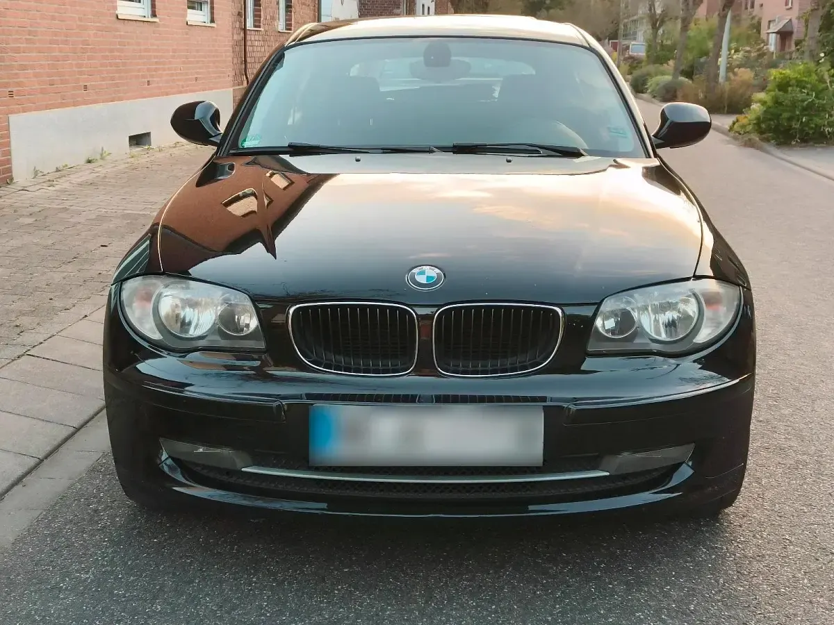 Second-hand BMW 116 122 CP (89 kW) 2010 Negru Hatchback