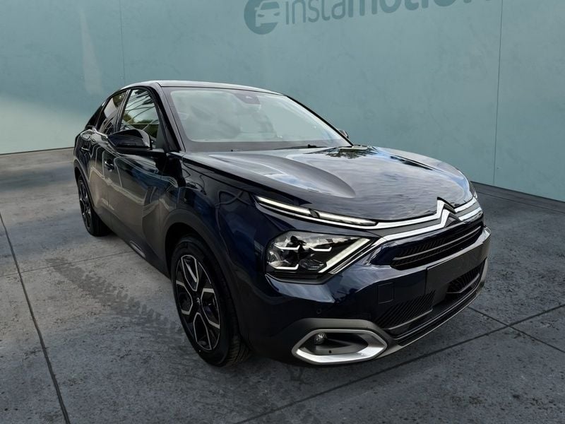Blau Gebraucht 2024 Citroën e-C4 Limousine | 32.040 € (Teuer) - Bild 1/4