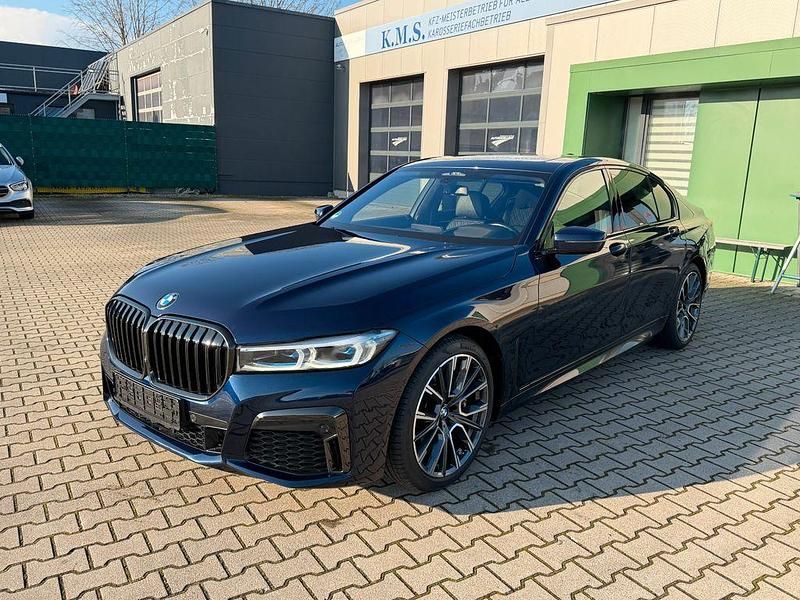 Tansanitblau ii metallic Gebraucht 2021 BMW 740 M Sport Limousine | 55.495 € (Fairer Preis) - Bild 1/4