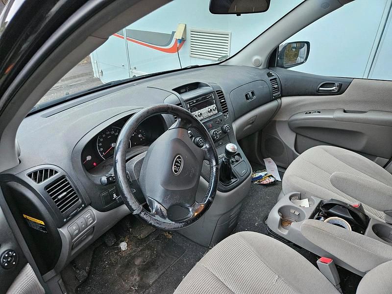 Gebraucht Kia Carnival 185 PS (136 kW) 2007 Schwarz Van / Kleinbus