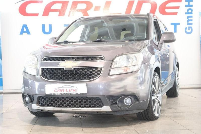 Smokey gray met Gebraucht 2012 Chevrolet Orlando LT Van / Kleinbus | 8.666 € (Fairer Preis) - Bild 1/4