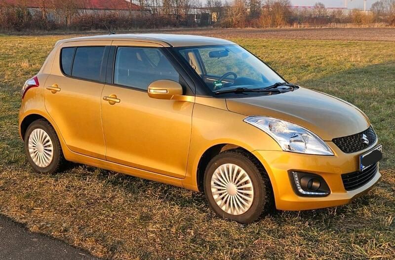Gold Gebraucht 2015 Suzuki Swift Kleinwagen | 6.200 € (Fairer Preis) - Bild 1/4
