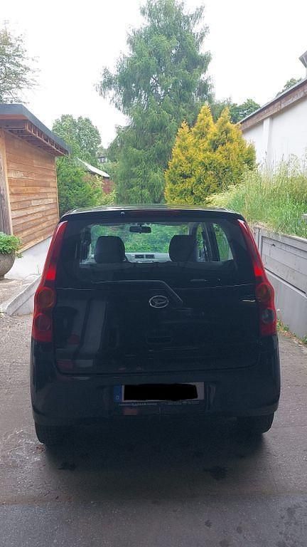 Schwarz Gebraucht 2010 Daihatsu Cuore Kleinwagen | 1.900 € (Fairer Preis) - Bild 1/2