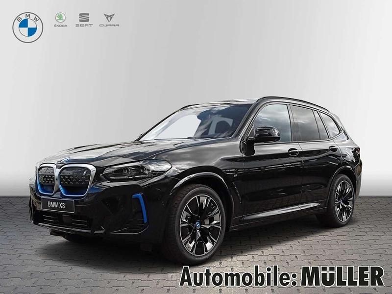 Carbonschwarz metallic Neu 2025 BMW iX3 Impressive SUV | 71.100 € - Bild 1/4