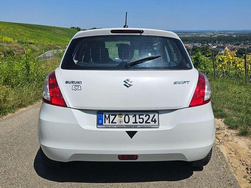 Usado Suzuki Swift Comfort 94 CV (69 kW) 2011 Blanco Utilitario