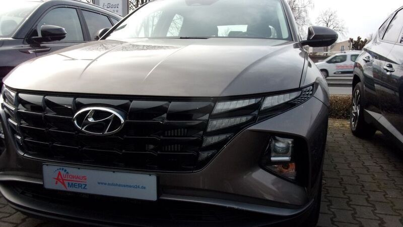 Braun Gebraucht 2021 Hyundai Tucson Comfort SUV | 21.790 € (Fairer Preis) - Bild 1/4