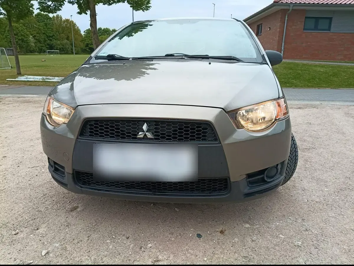 Gebraucht Mitsubishi Colt 75 PS (55 kW) 2009 Braun Kleinwagen