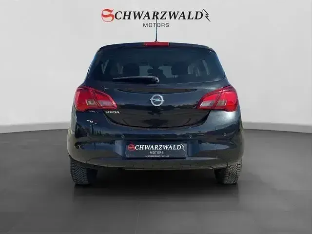 Używany Opel Corsa drive 110 KM (80 kW) 2016 Czarny Hatchback