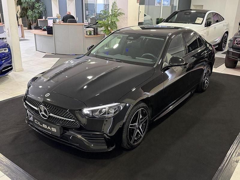 Schwarz Gebraucht 2022 Mercedes C300e AMG line Limousine | 39.900 € (Etwas zu teuer) - Bild 1/4