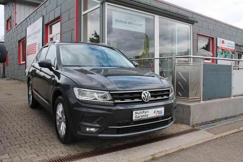Grau Gebraucht 2018 VW Tiguan Highline SUV | 21.507 € (Fairer Preis) - Bild 1/4