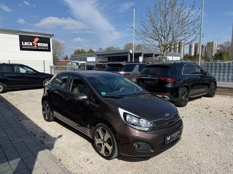 Gebraucht Kia Rio Platinum Edition 90 PS (66 kW) 2014 Braun Limousine
