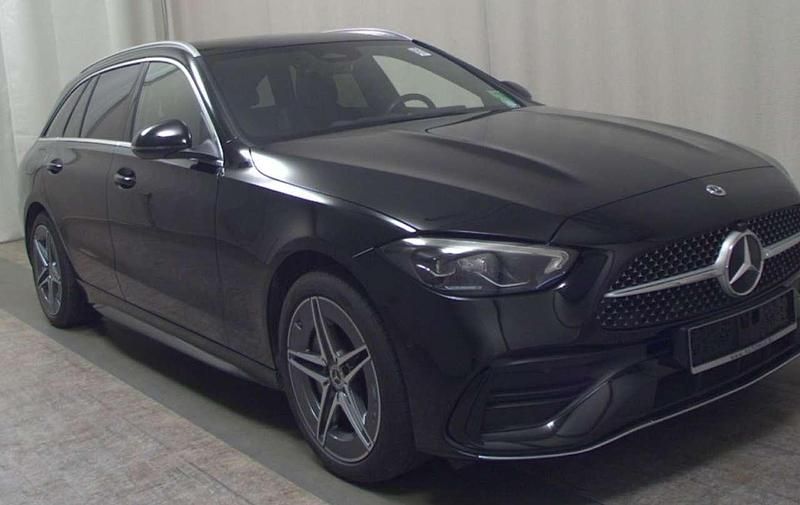 Schwarz/baltic black Gebraucht 2023 Mercedes C300e AMG line Kombi | 36.950 € (Guter Preis) - Bild 1/4