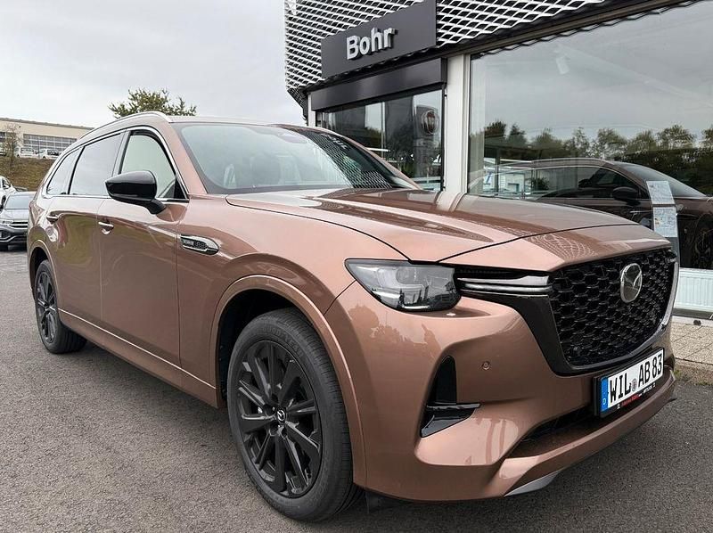 Braun Gebraucht 2025 Mazda CX-80 Homura-Line SUV | 61.780 € (Etwas zu teuer) - Bild 1/4