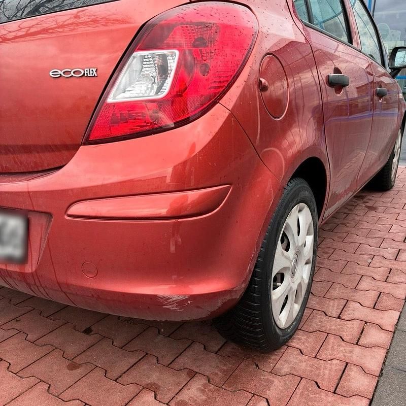 Gebraucht Opel Corsa 69 PS (50 kW) 2012 Rot Kleinwagen