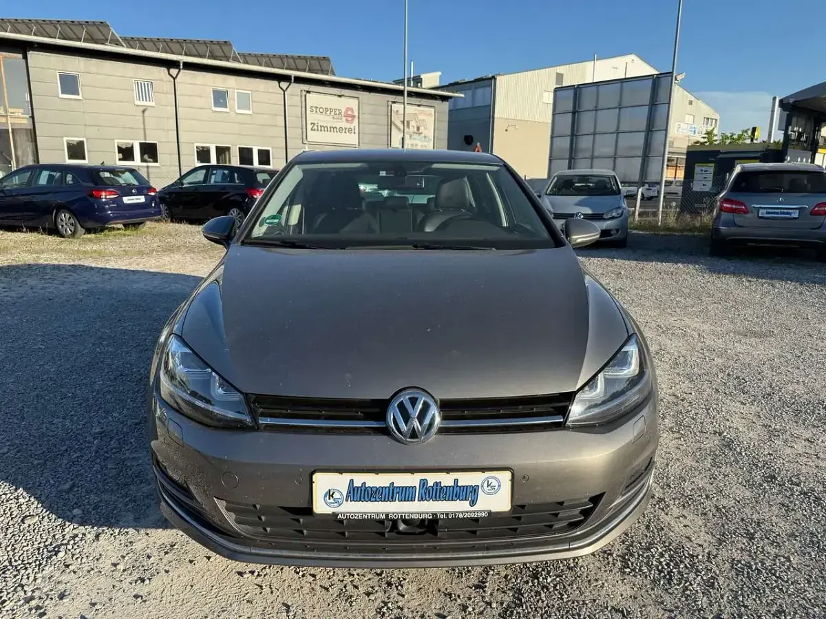 Gebraucht VW Golf VII Highline 140 PS (102 kW) 2013 Limestone grey metallic Kleinwagen