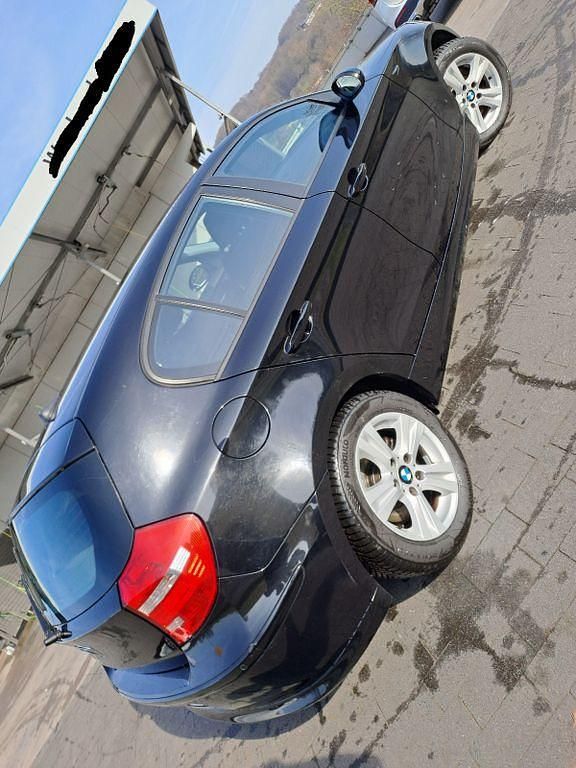 Gebraucht BMW 116 122 PS (89 kW) 2009 Schwarz Kleinwagen